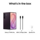 Samsung Galaxy Z Fold8 Ultra box contents on a white background, labeled 'What's in the box' with three items: the folded phone, a USB-C charge cable, and an ejection pin. The phone is shown in dark purple/black with a pink and purple wallpaper.