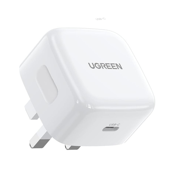 A white UGREEN USB-C power adapter with a UK three-pin plug, featuring a glossy finish and the UGREEN brand name printed on the top face.