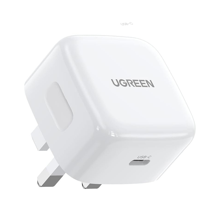 A white UGREEN USB-C power adapter with a UK three-pin plug, featuring a glossy finish and the UGREEN brand name printed on the top face.