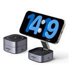 UGREEN wireless charging stand and dock shown with a smartphone on a charging base, alongside a smaller cylindrical wireless charging pad, on a clean white background.