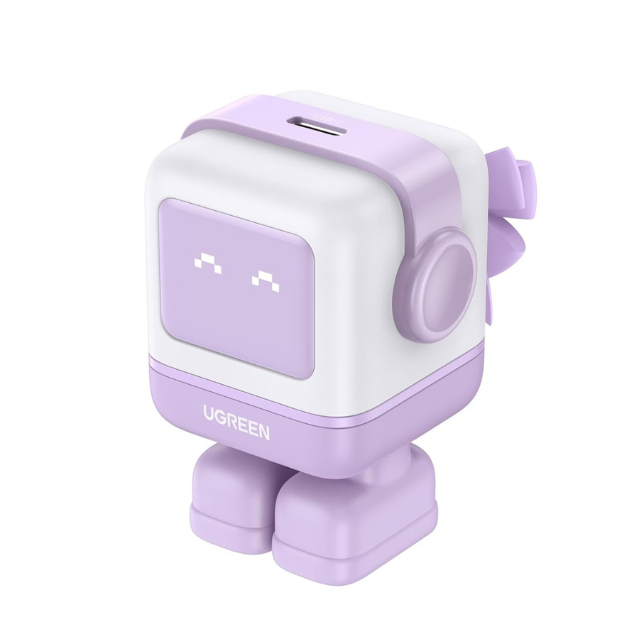 A UGREEN mini robot-shaped portable charger in pastel purple and white, featuring a small pixelated screen on the front, a side button, and a charging port on top, set against a solid white background.