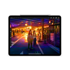 An iPad shown from the back on a white background, displaying a colorful digital illustration of people at a bus stop. An Apple Pencil is resting horizontally above the top edge of the tablet.